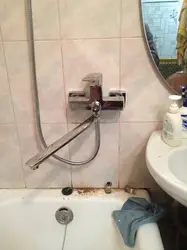 Location of the faucet in the bathroom photo