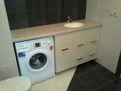 Built-in washing machines in the bathroom photo