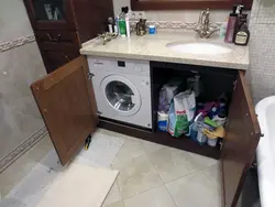 Built-in washing machines in the bathroom photo