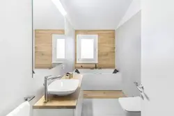 White bathroom design with wood