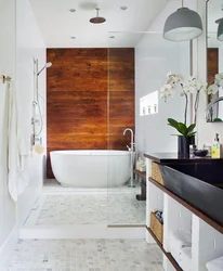 White bathroom design with wood