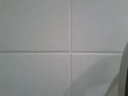 Grout for gray tiles in the bathroom photo