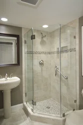 Bathroom design with shower and corner bath