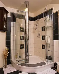 Bathroom design with shower and corner bath