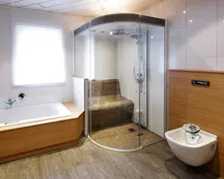 Душ пен бұрыштық ваннасы бар ванна бөлмесінің дизайны