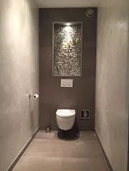 Toilet design in an apartment using decorative plaster