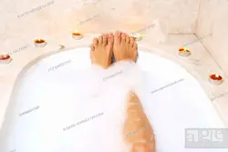 Photo Of A Bathtub With Foam And Legs