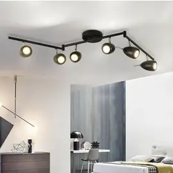 Track lamps in the bedroom interior