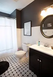 Bath interior with dark furniture