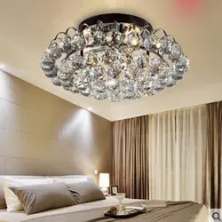Photo chandeliers low in the bedroom