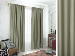 Olive curtains in the bedroom interior