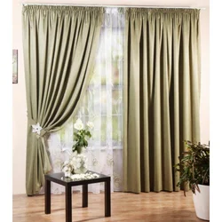 Olive curtains in the bedroom interior