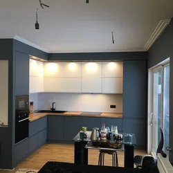 Kitchen with high upper cabinets photo