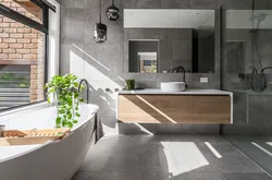 Bathroom design in gray tone with wood