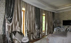 Velvet curtains in the bedroom interior photo