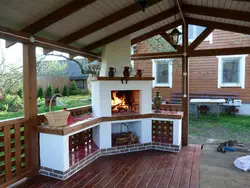 Summer kitchen design with barbecue area