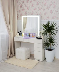 Photo of a dressing table in the bedroom with a mirror