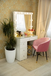 Photo of a dressing table in the bedroom with a mirror