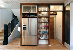 Kitchen interior with built-in wardrobe