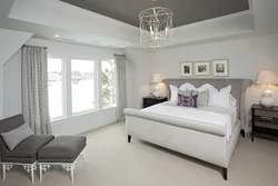 Серый натяжной потолок в спальне фото