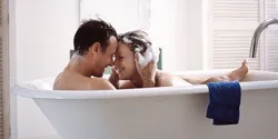 Photo of a couple in a bubble bath