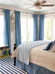 Blue curtains in the bedroom photo