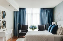 Blue curtains in the bedroom photo