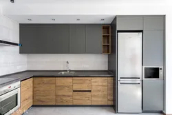 Gray kitchen with wooden facades photo