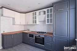 Gray Kitchen With Wooden Facades Photo