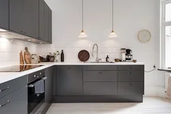 Gray kitchen with wooden facades photo