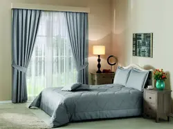 Modern curtains in the bedroom interior photo