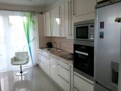 Photo of kitchen in line with refrigerator