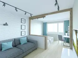 Living room and bedroom in one room with a balcony photo