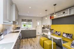 Gray sofa in the kitchen interior