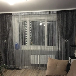 Thread curtains in the living room photo