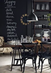 Black wall in the kitchen interior photo