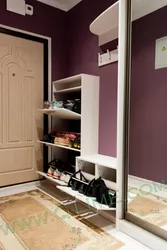 Sliding Wardrobes In The Hallway With A Mirror And Shoe Rack Design