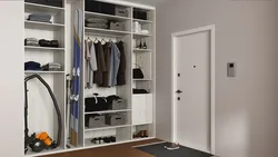 Sliding wardrobes in the hallway with a mirror and shoe rack design