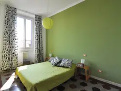 Green wallpaper in the bedroom interior what kind of curtains photo