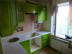 Kitchen design 6 m2 with geyser and refrigerator