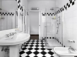 Photo of black and white bathtubs with showers