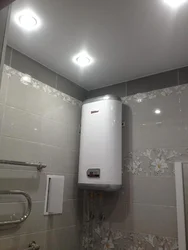 Photo of a water heater in a bathroom
