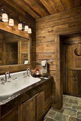 Photo of a bathtub in a wooden style