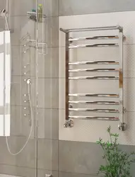 Электрычны полотенцесушитель у ваннай фота ў інтэр'еры