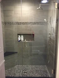 Bathroom with tile shower without tray design