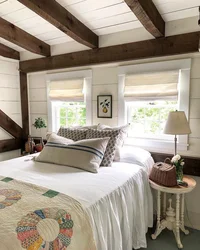 Bedroom design at the dacha in a wooden house