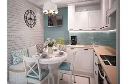 Small kitchen design with corner sofa