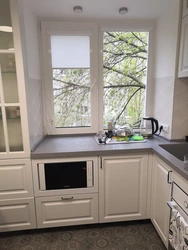 Interior and design of a small kitchen with one window