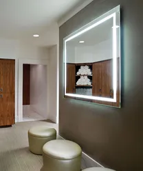 Mirror with lighting in the hallway design