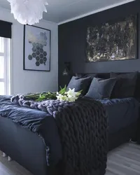 Dark gray bed in the bedroom photo